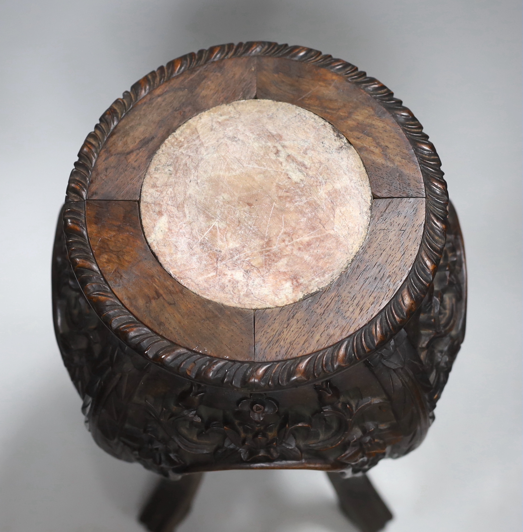 A Chinese carved hardwood marble topped vase stand, height 46cm